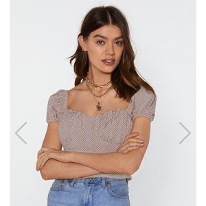 Brand new button up blouse. Never worn with tags